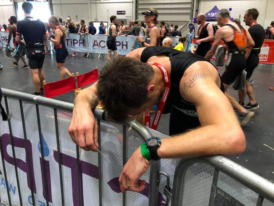 Joe recovering from completing the 2019 London Triathalon